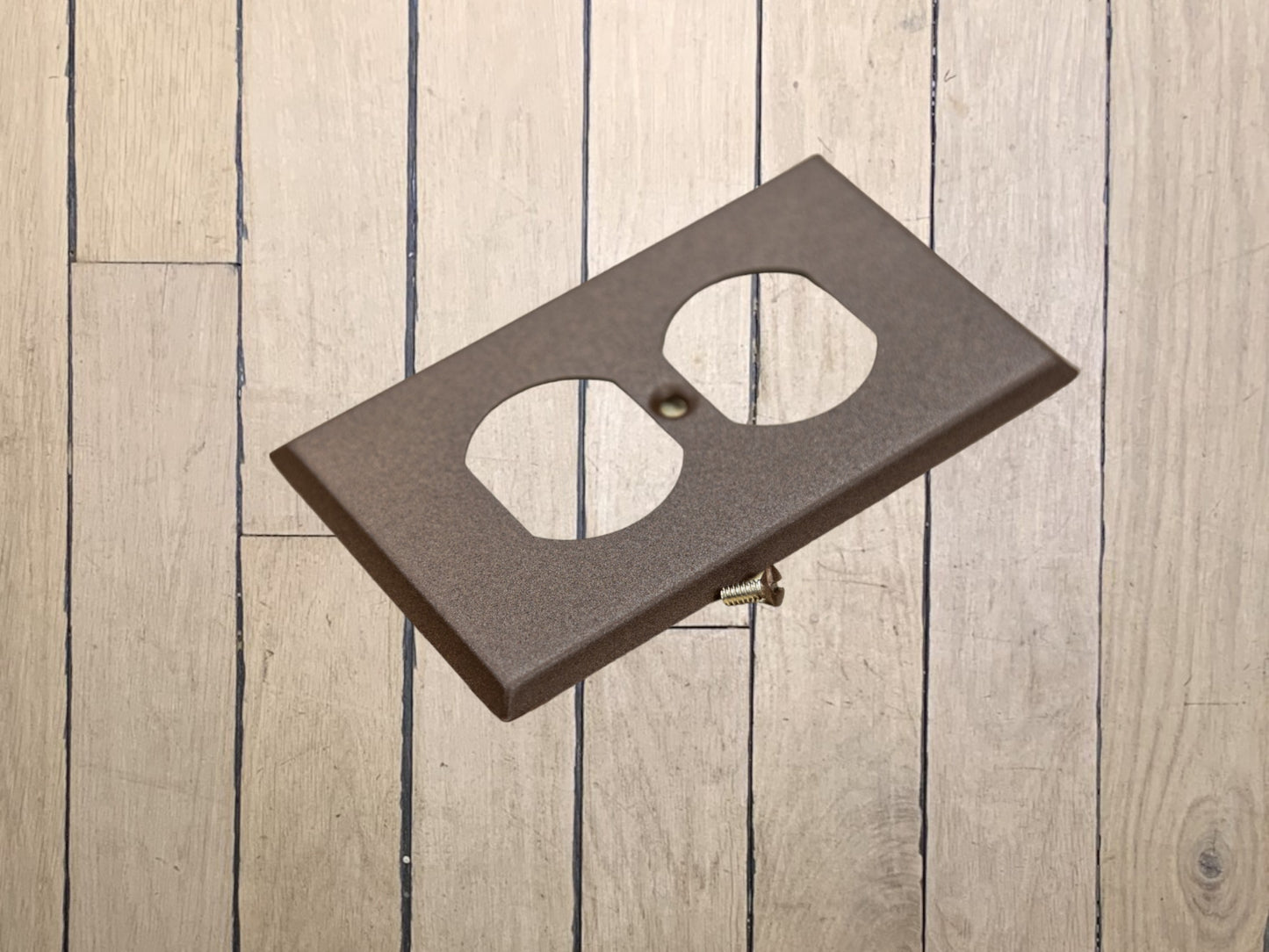 Walnut Texture powder coated Toggle, Rocker, Duplex, and Blank standard size metal switch plates.  Dark brown outlet cover