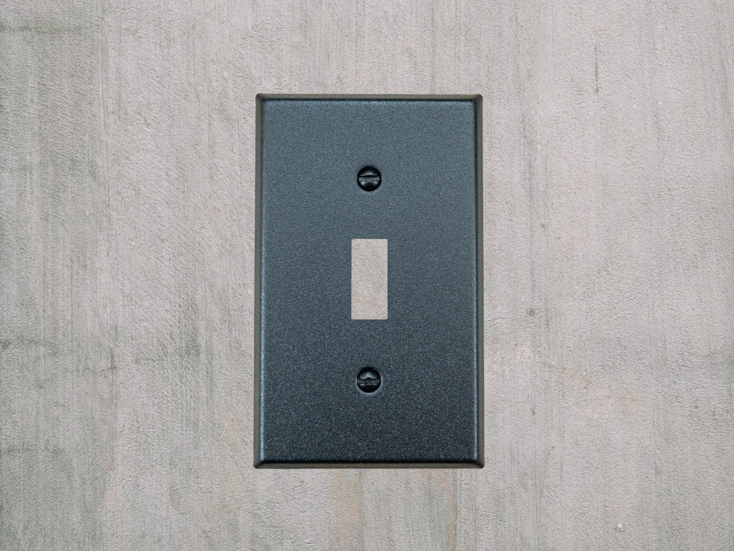 Matte Black Texture powder coated Toggle, Rocker, Duplex, and Blank standard size metal switch plates.