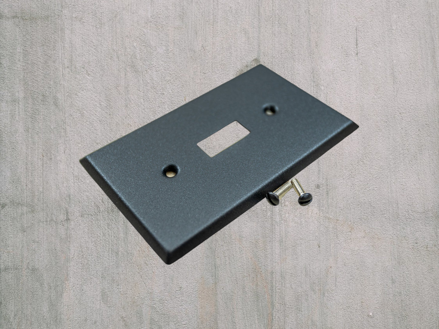 Matte Black Texture powder coated Toggle, Rocker, Duplex, and Blank standard size metal switch plates.