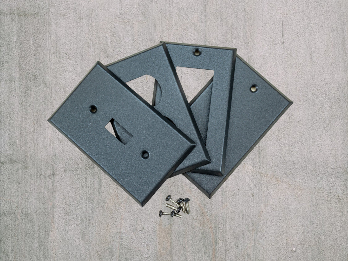 Matte Black Texture powder coated Toggle, Rocker, Duplex, and Blank standard size metal switch plates.