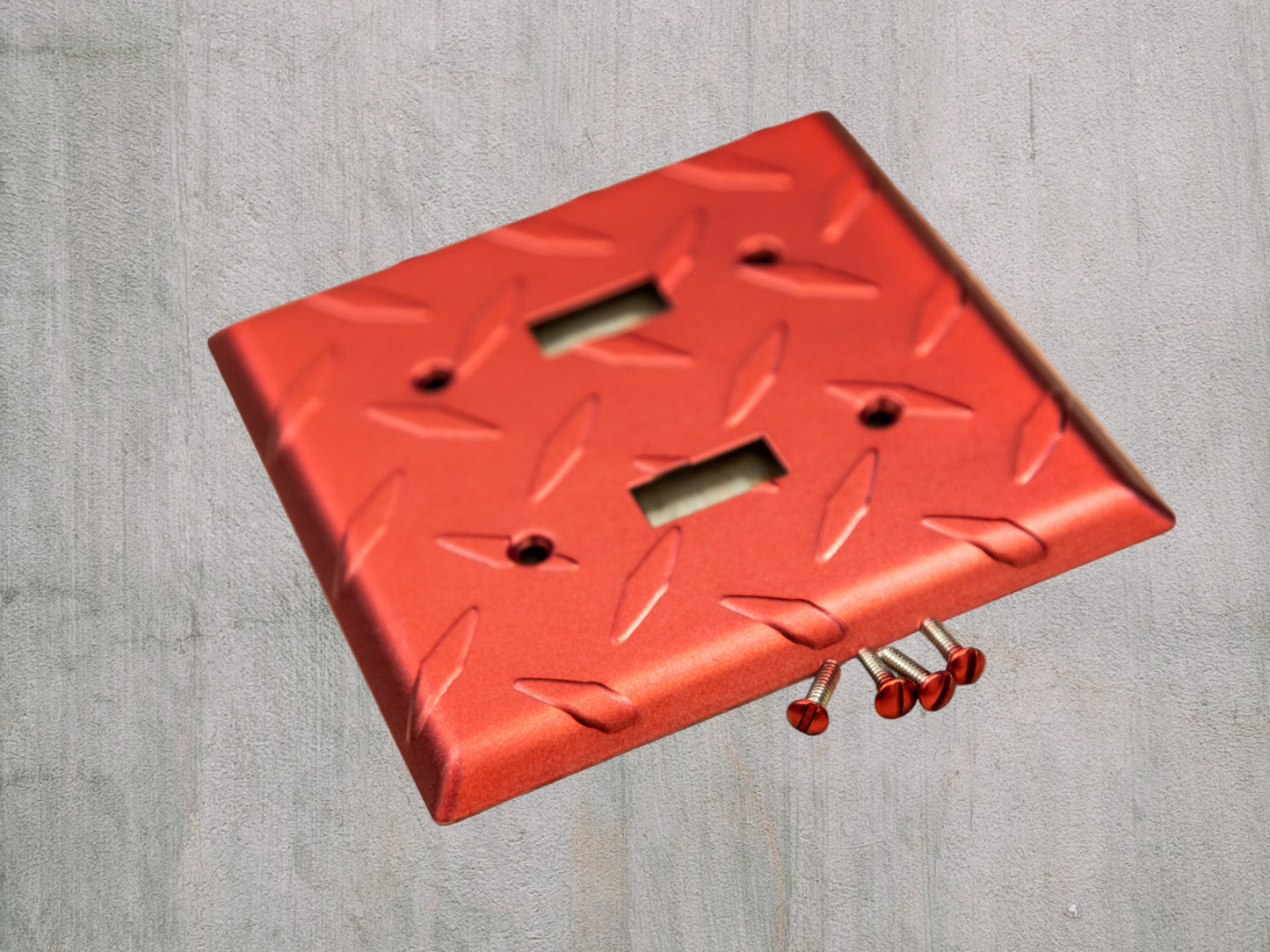 Red Anodized powder coated diamond plate metal Toggle, Rocker, and Duplex wall switch plates. Auto enthusiasts garage decor