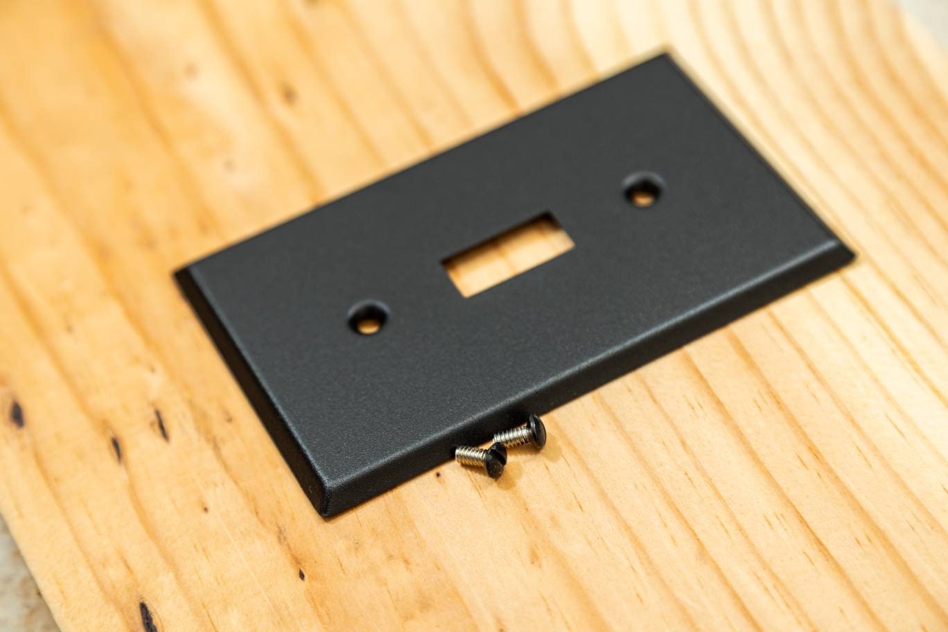 Rustic Black Cast powder coated Toggle, Rocker, Duplex, and Blank standard size metal switch plates.