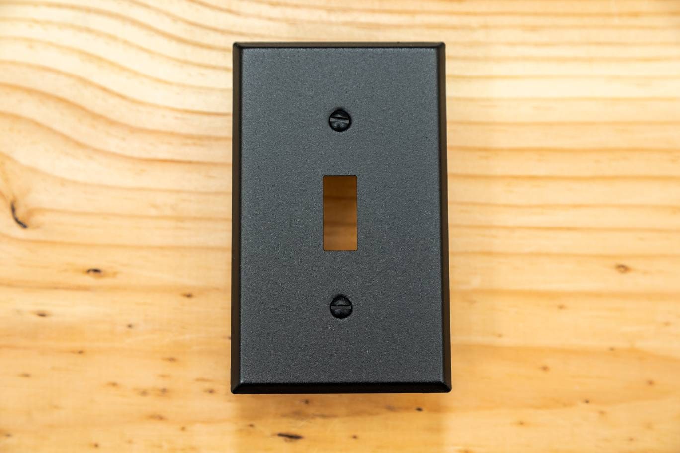 Rustic Black Cast powder coated Toggle, Rocker, Duplex, and Blank standard size metal switch plates.